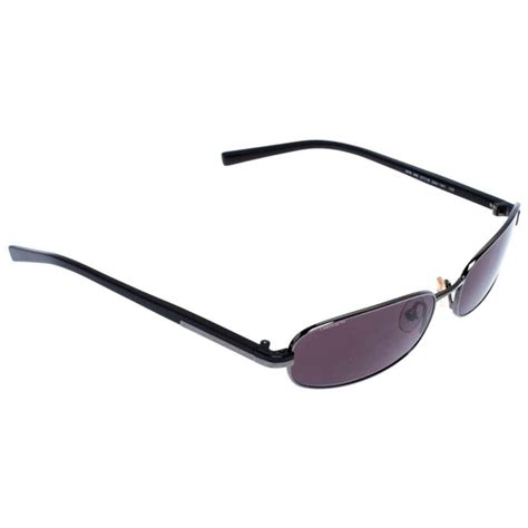 prada l metal gun|Prada Gunmetal Rectangle Steel Sunglasses .